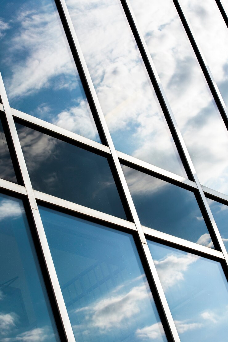 low-angle-building-with-large-windows_23-2148252792