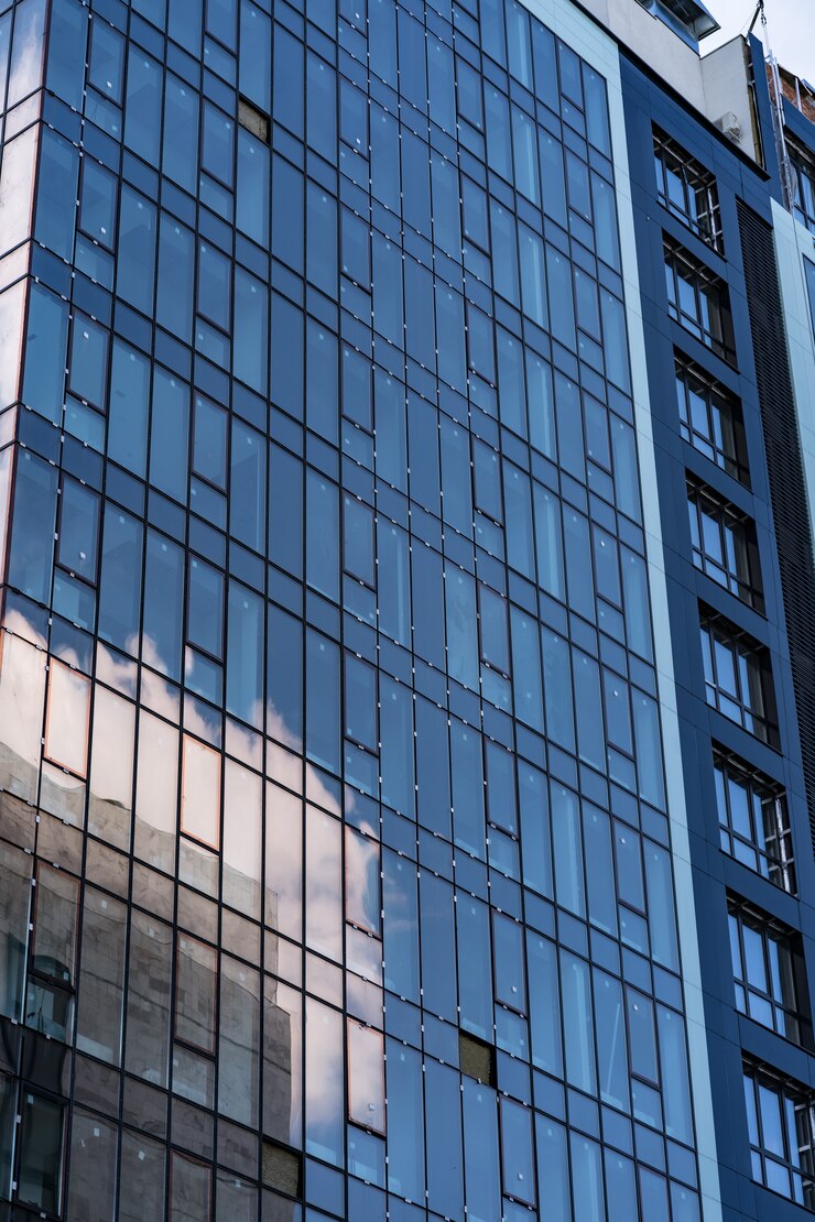 modern-glass-building-architecture-modern-building-with-structural-lines_158595-6334